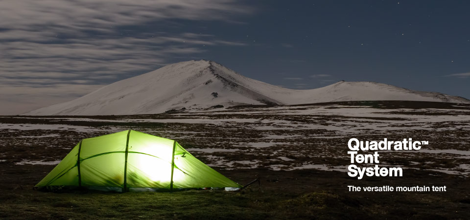 Quadratic Tent at night with snow covered hills and stars